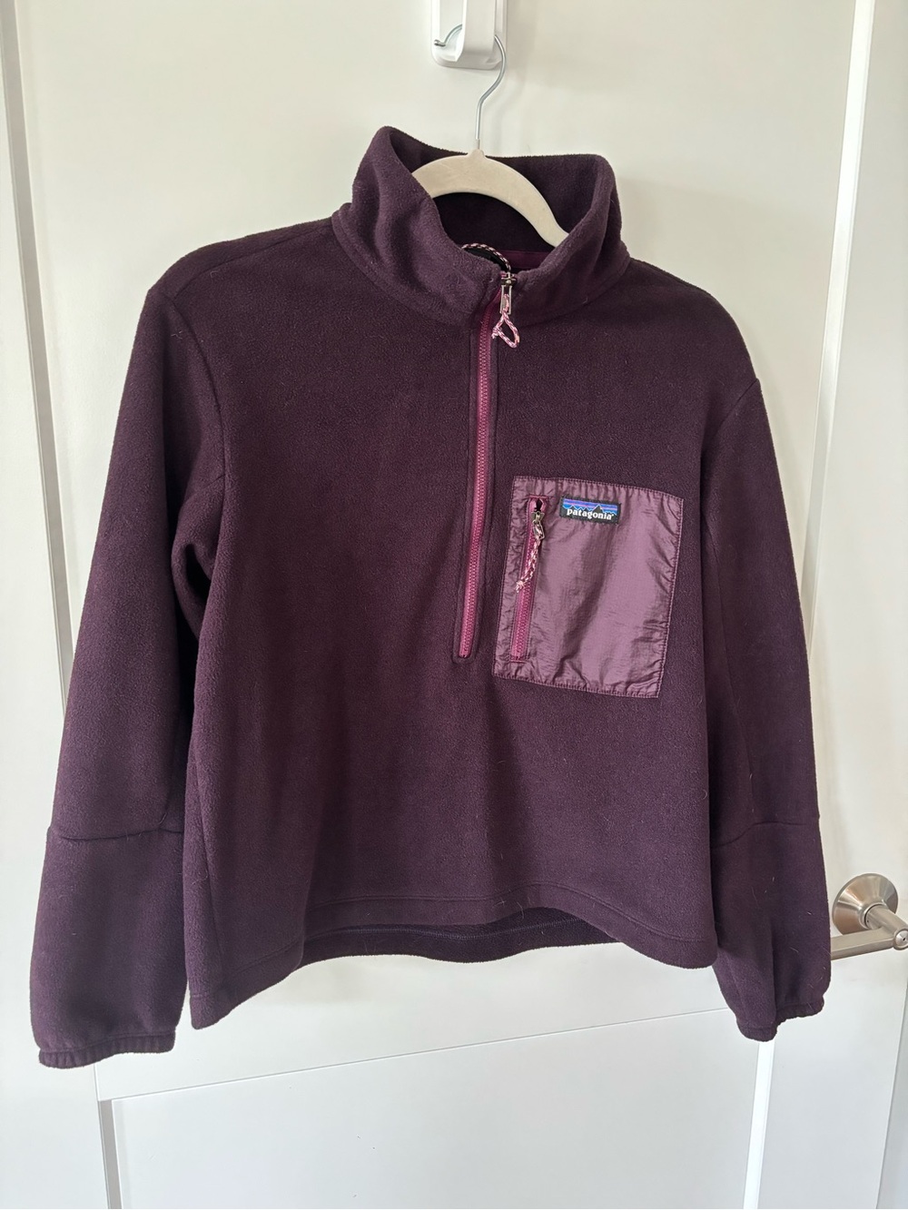 Patagonia women’s microdini 1/2 zip pullover in plum.  Small